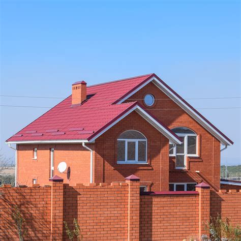 pic of red brick house with metal roof|roof colors for brick house.